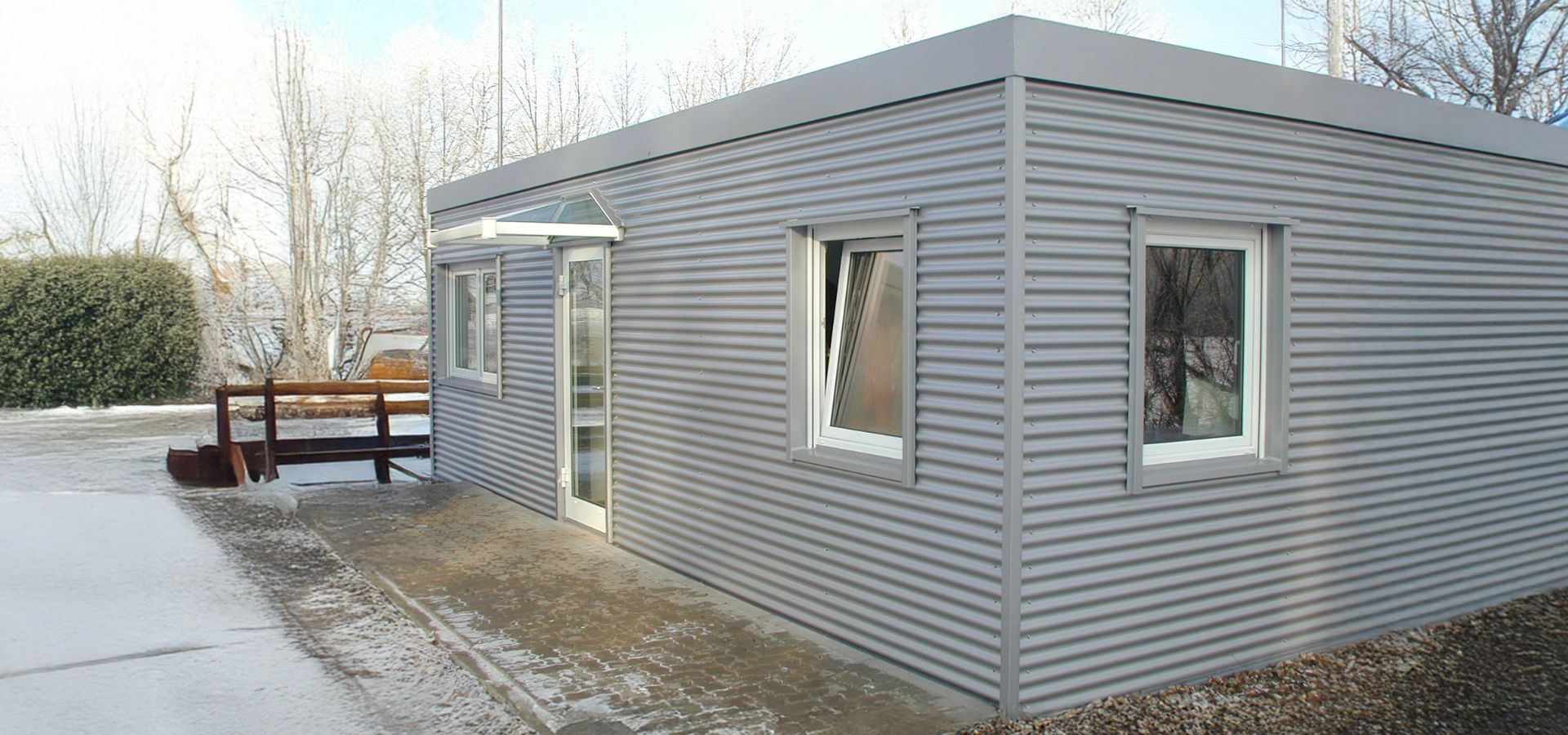 Systemcontainer verkleidet mit Aluwellen